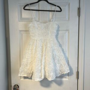 White floral appliqué mini dress
US Size Small